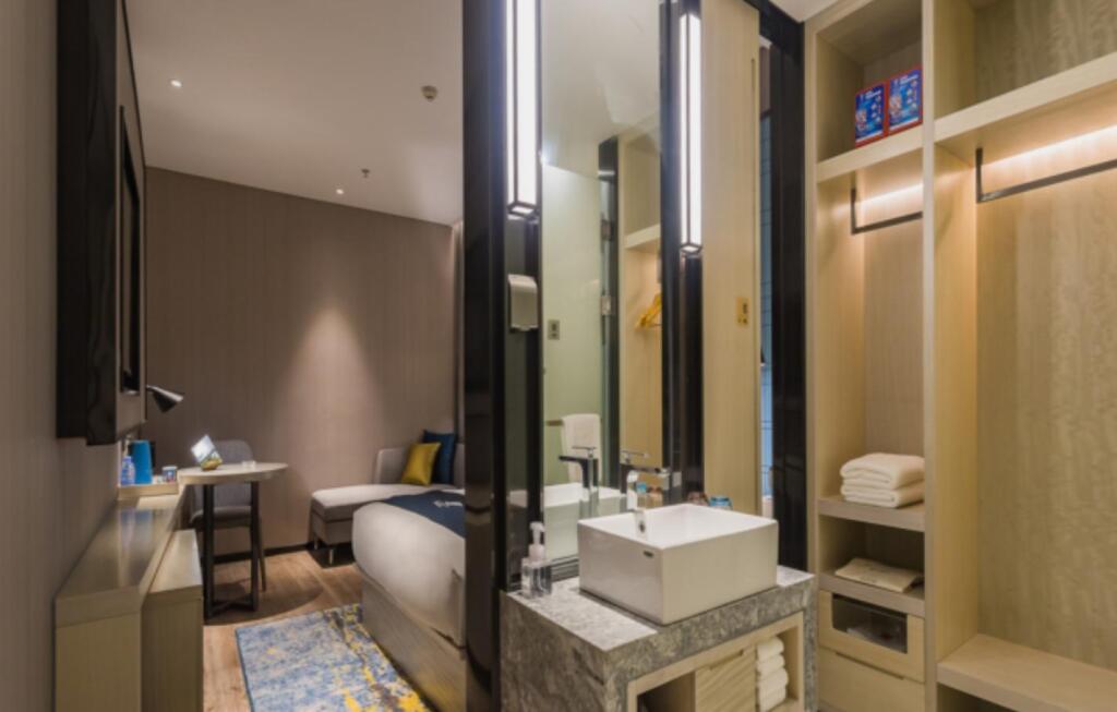 Гуанчжоу: Echarm Hotel Guangzhou Xintang Metro Station Suncity