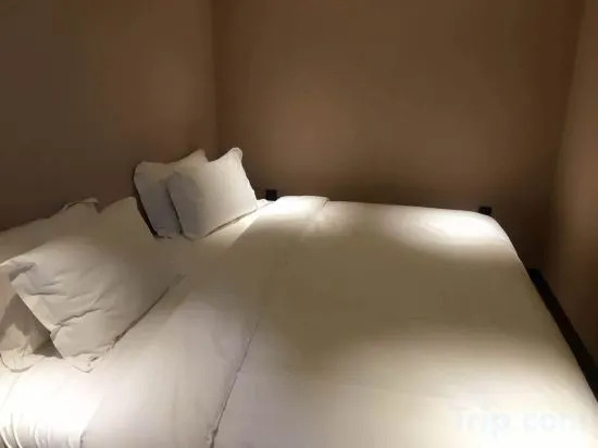 Ичунь Хэйлунцзян: Xinhao Business Hotel