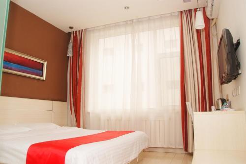 Далянь: Junyi Chain Hotel (Dalian Jinzhou Ansheng Shopping Plaza)