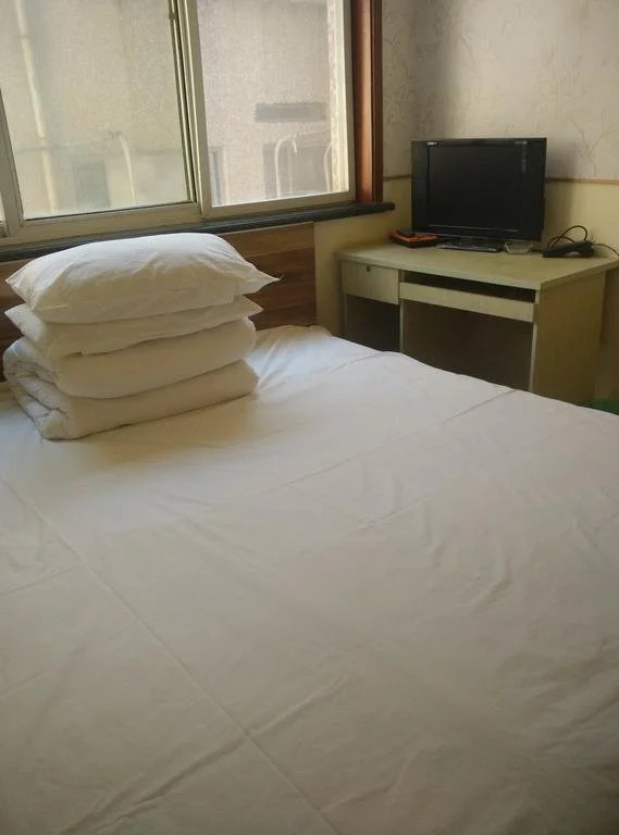 Циндао: Qingdao JuMengYuan Inn
