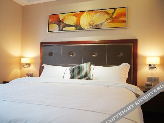 Панжихуа: Impression Realm Business Hotel (Wal - Mart Plaza Branch near Panzhihua University)