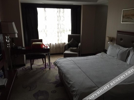 Панжихуа: Impression Realm Business Hotel (Wal - Mart Plaza Branch near Panzhihua University)