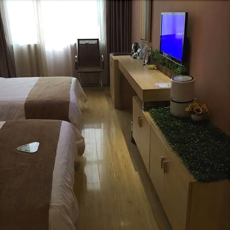 Хэчи: Vienna Hotel Guangxi Hechi Jinchengjiang Baima Street