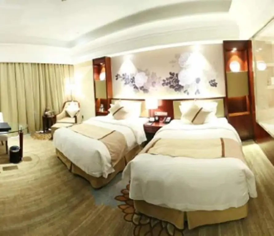 Цзиньхуа: New Century Hotel Yiwu