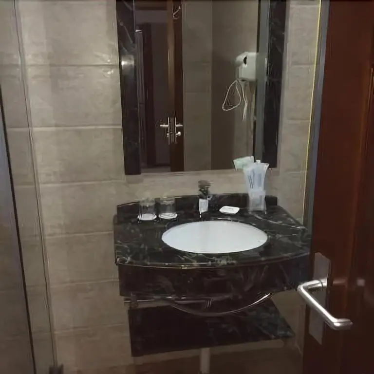 Яньтай: Jinweili Business Hotel