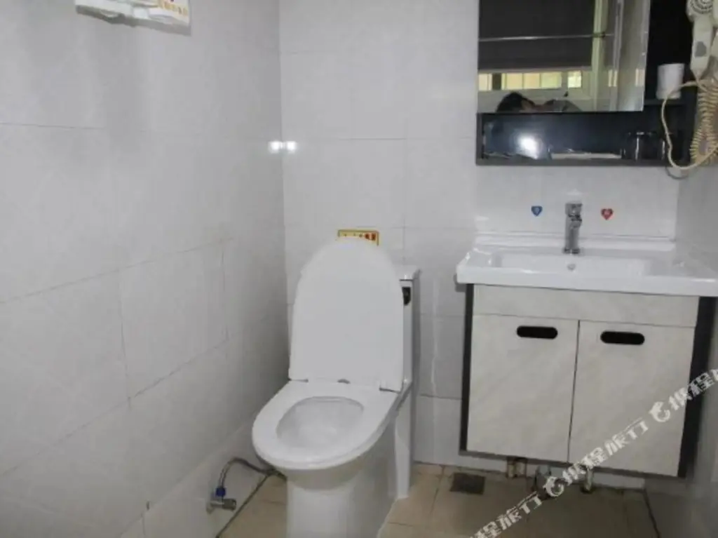 Чанша: Zhenhua Business Hotel (South Bus Station Desiqin Square Branch)