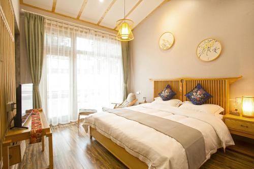 Цзясинь: Tongxiang Wuzhen Linlu Guesthouse