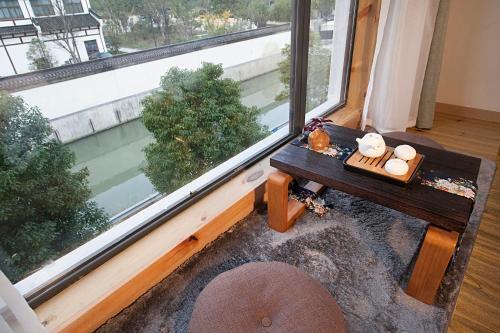 Цзясинь: Tongxiang Wuzhen Linlu Guesthouse