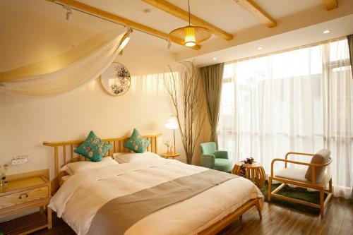 Цзясинь: Tongxiang Wuzhen Linlu Guesthouse