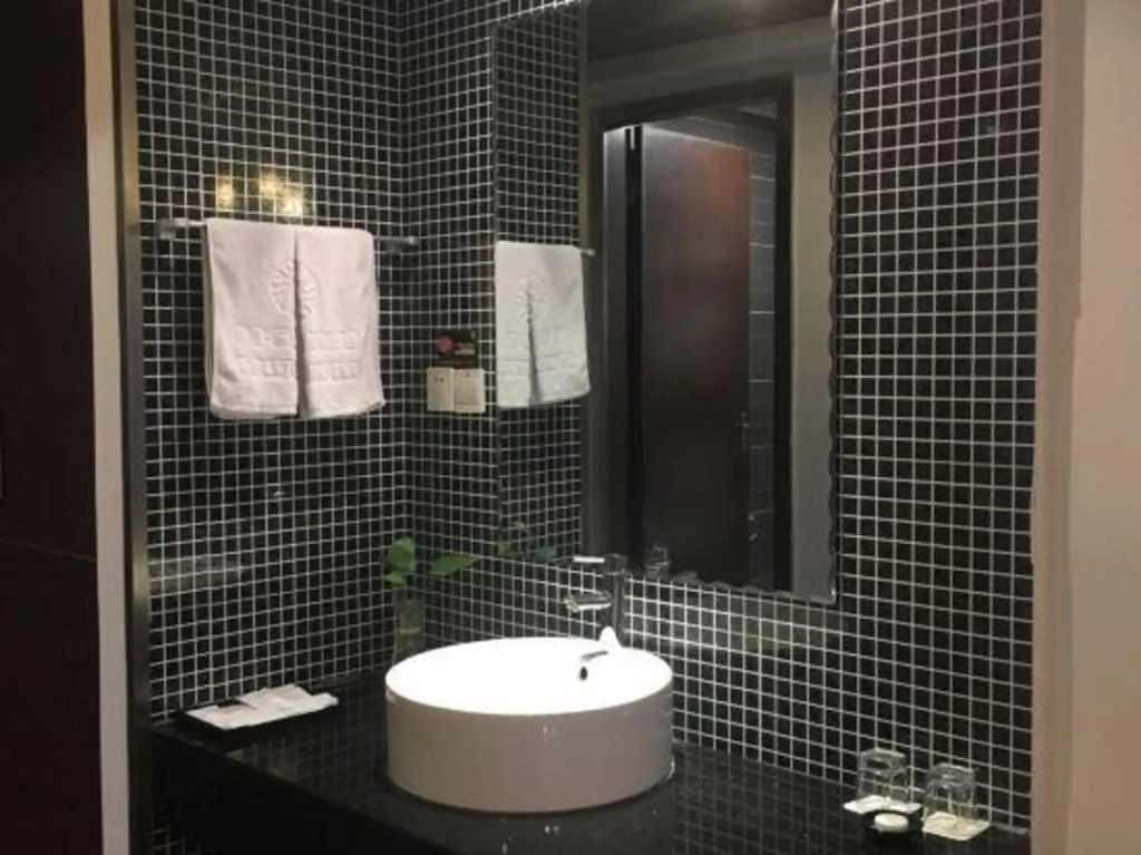 Цзясинь: Jiaxing Guantang Leju Bussiness Hotel