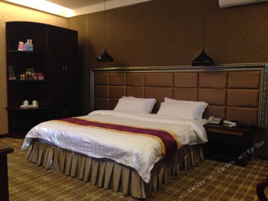Хами: Xinhua Business Hotel