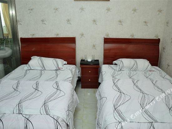 Линьи: Yinan Shangjia Express Business Hotel