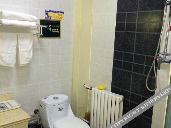 Циндао: Ama'ni Business Hotel