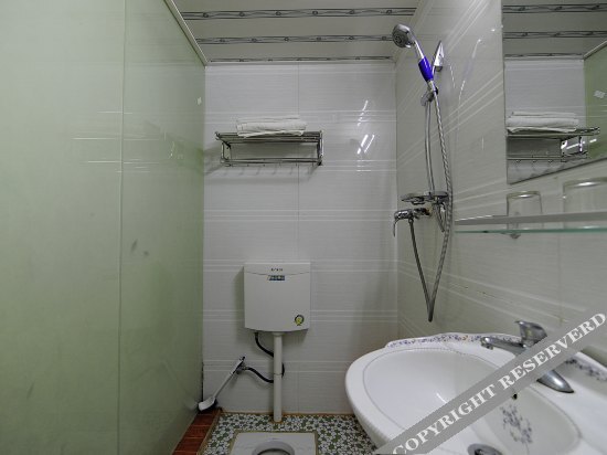 Уян: Xinhualou Guest House