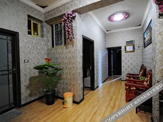 Уян: Xinhualou Guest House