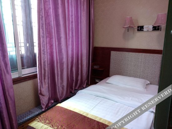 Уян: Xinhualou Guest House