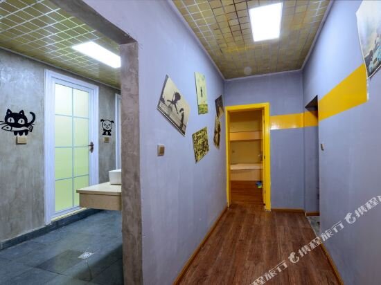 Цзинхун: Xishuangbanna Zouyi International Youth Hostel
