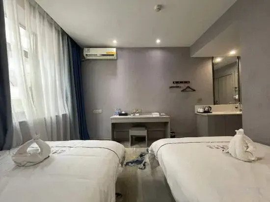 Цзюцюань: Hongxin Business Hotel