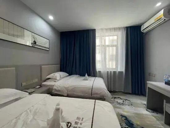Цзюцюань: Hongxin Business Hotel