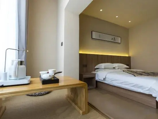 Цзюцюань: Hongxin Business Hotel