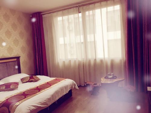 Лешан: Dengyue Hotel