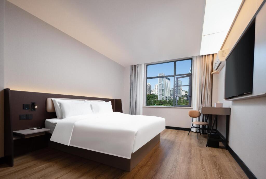 Ухань: Hanting Hotel Wuhan Hongshan Plaza Subway Station