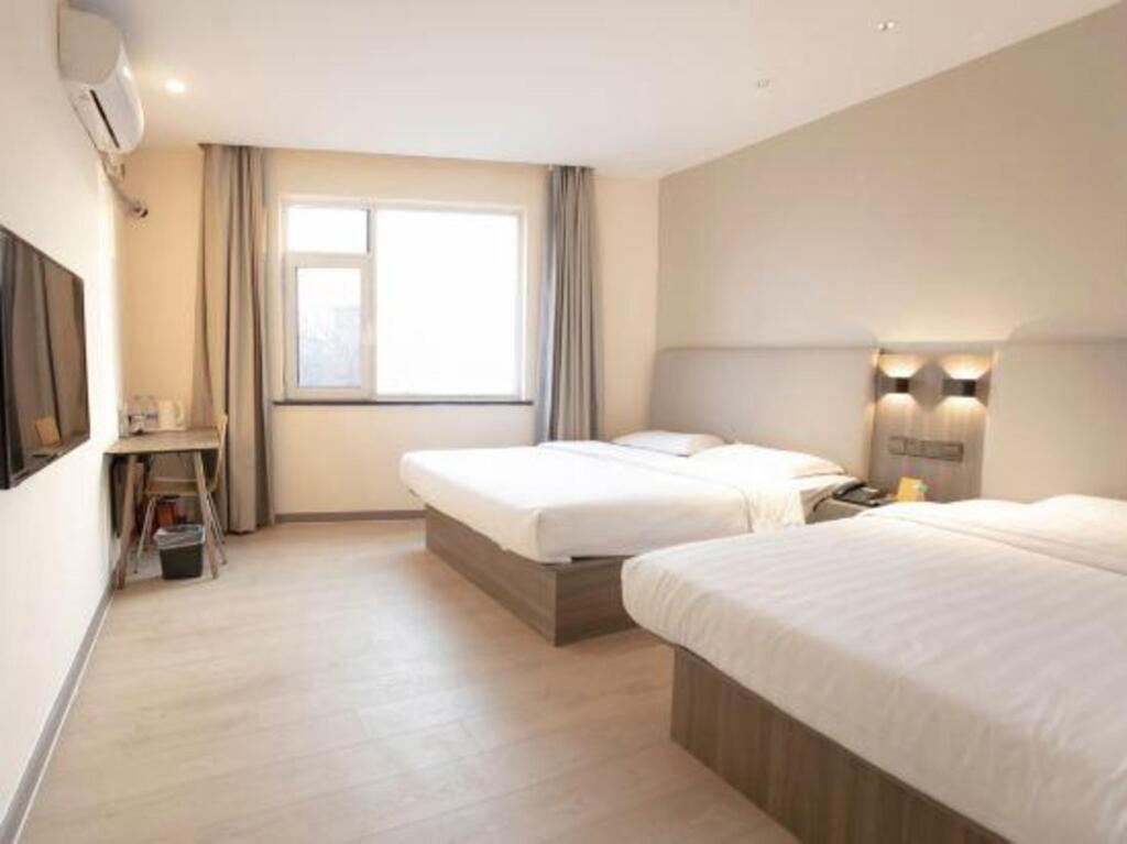 Тяньцзинь: 7Days Inn Tianjin Binhai Passenger Station Huabei Ceramics Branch