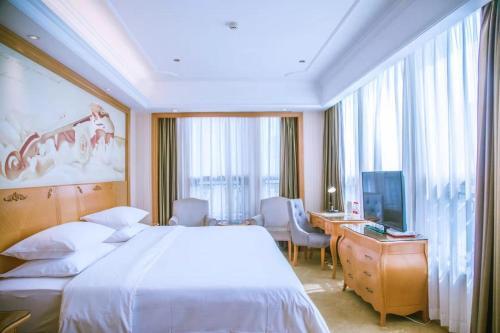 Юнъян: Vienna International Hotel Guizhou Weng'an Qi Long Fun Moore City Branch