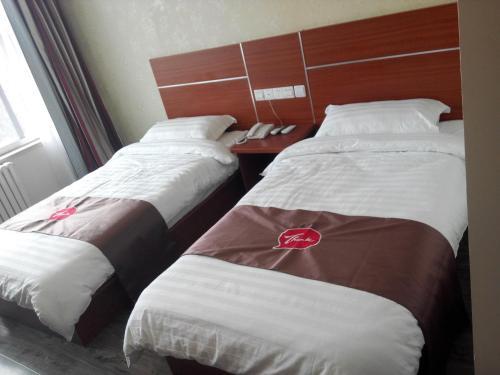 Яньтай: Thank Inn Chain Hotel Shandong Yantai Xixiatao Village High Speed Railway Station