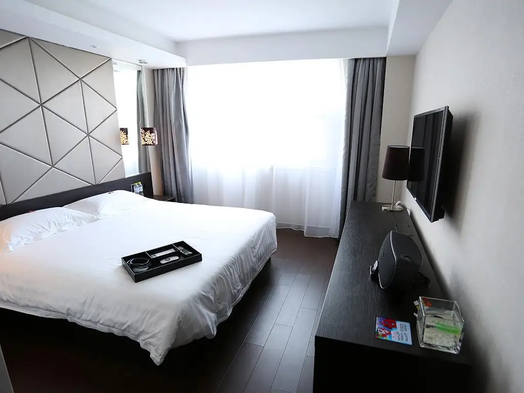 Циндао: Orange Hotel Qingdao The Mixc