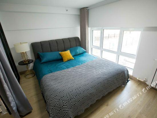 Циндао: Mu'en Loft Light Luxury Apartment (Qingdao North Railway Station)