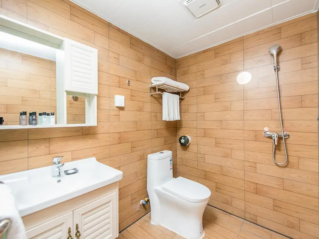 Фошань: WOWQU Serviced Apartment Foshan Kuiqi Road Rainbow Shopping Center