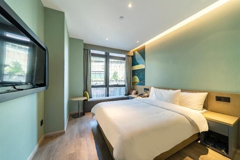 Шанхай: Hanting Premium Hotel Shanghai Xinzhuang Business Center
