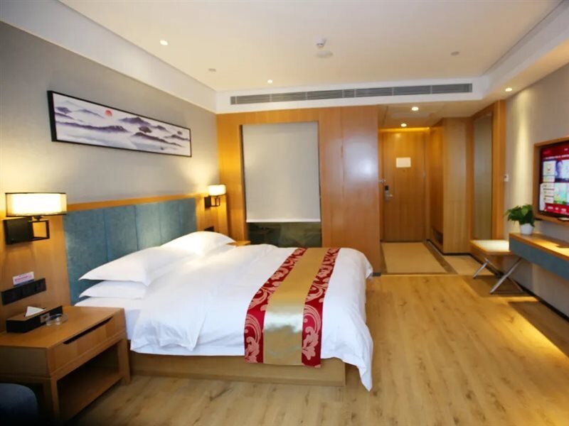 Huanpeng Holiday Hotel — фото 1