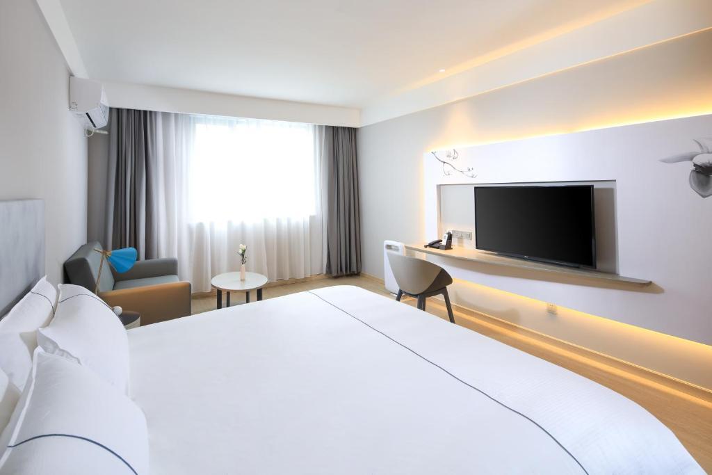 Шанхай: Magnolia Hotel Shanghai Xintiandi Branch