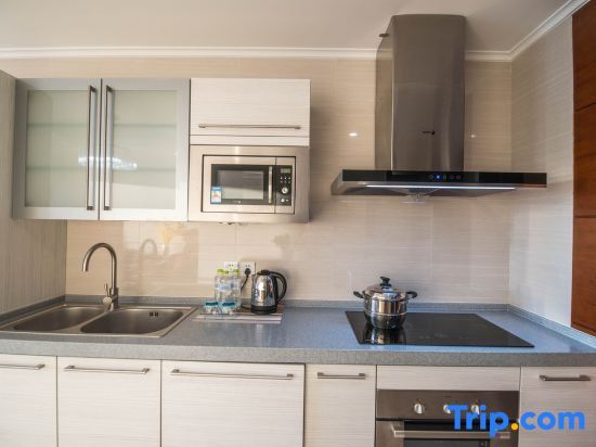 Циндао: Yuelan Seaview Hotel Apartment (Qingdao May Fourth Square China Railway Center)