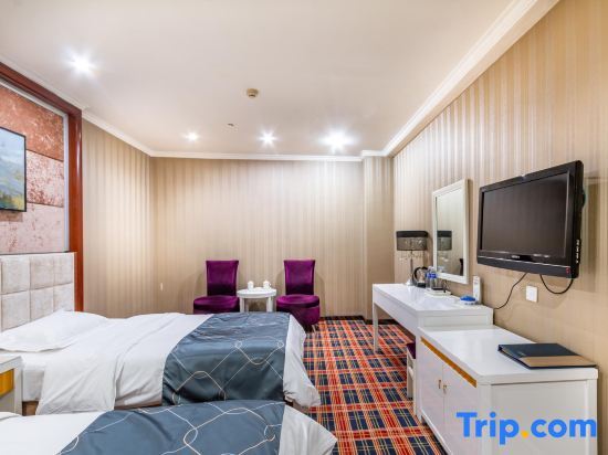 Синьян: Oupai Jindi Grand Hotel (Xinyang International Trade City East Railway Station)