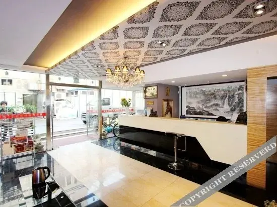 Циндао: Aijia Fengshang Hotel Dayao