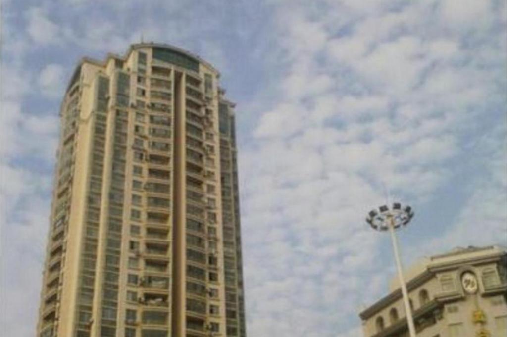 Циндао: Qingdao Ruyi Seaview Express Apartment