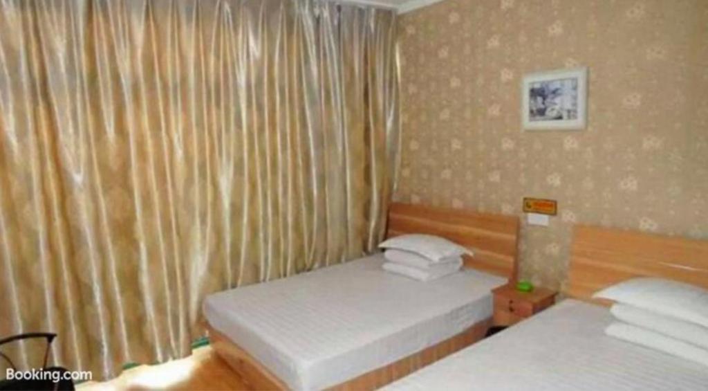 Циндао: Qingdao Ruyi Seaview Express Apartment