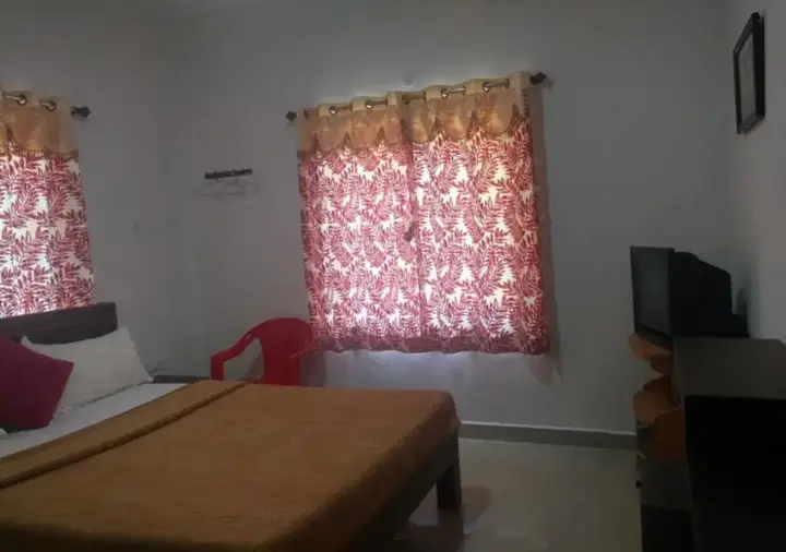 Ути: Kumaran Cottage