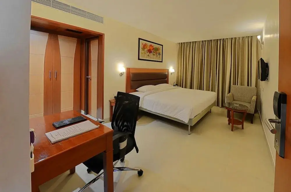 Веллор: Poppys Anukula Residency - Vellore