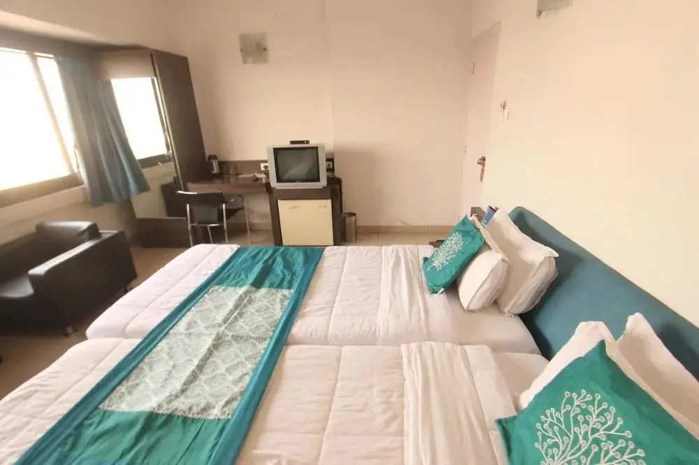 Сурат: OYO 1279 Tex Palazzo Hotel