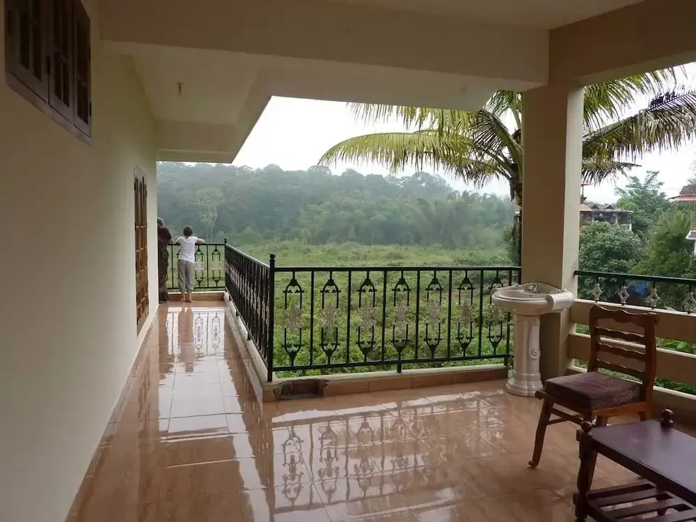 Кумили: Jungle Palace Homestay