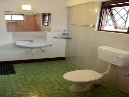 Ути: Jungle Woods Cottage