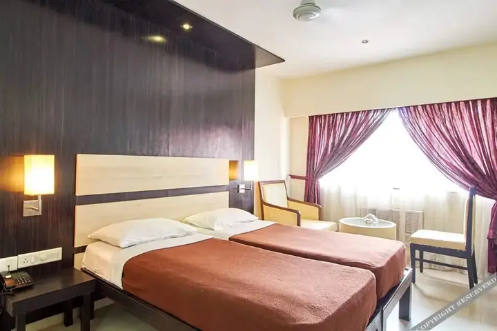 Мангалур: Ayush International Hotel