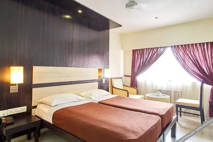 Мангалур: Ayush International Hotel