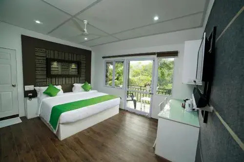 Муннар: Moselberg Riverside Cottages
