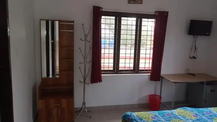 Куттикканам: Thekkekara Tourist Home Vagamon
