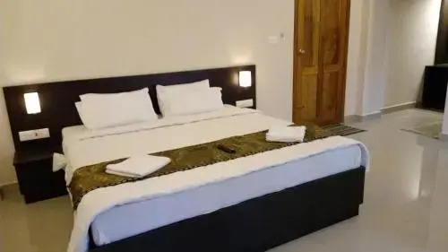 Кумили: Charles Premier Inn